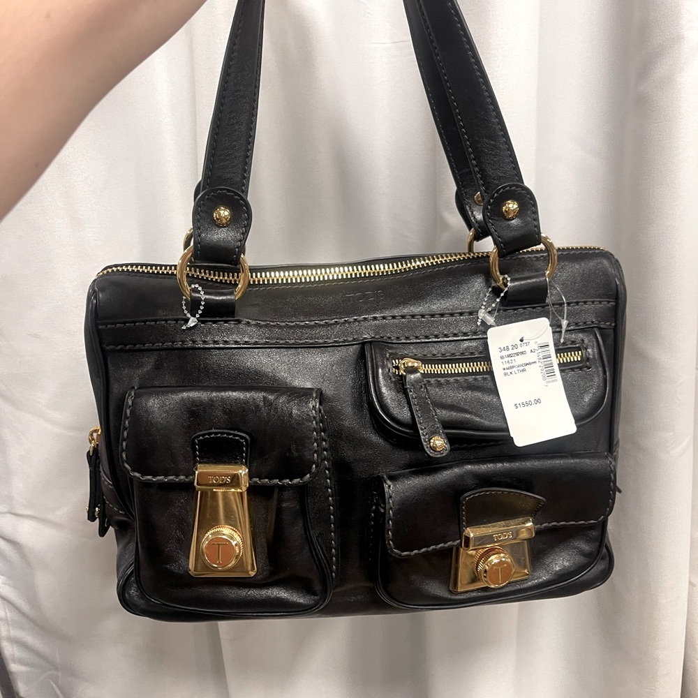 Brand new Tods purse. Purchased at Saks fifth Avenue.